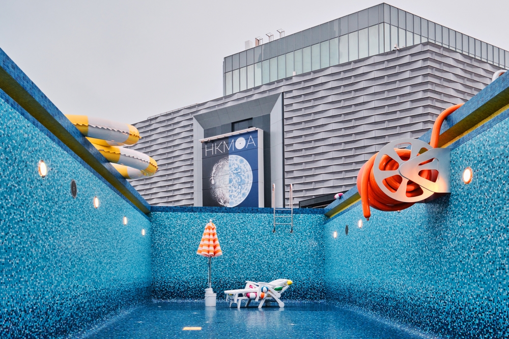 Hong Kong - April 24 2023: The installation of a large swimming pool located in front of The Hong Kong Museum of Art